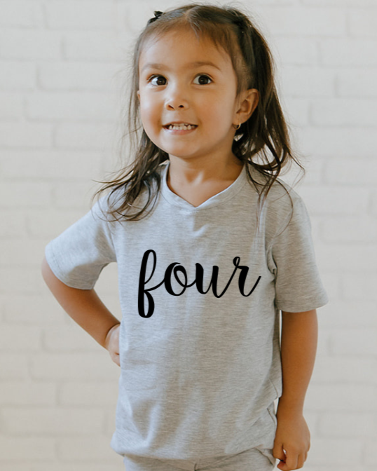Girl’s burgundy shirt with white cursive five and boy’s navy shirt with white block THREE