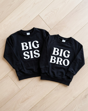 Black BIG SIS and BIG BRO crewneck flat lay
