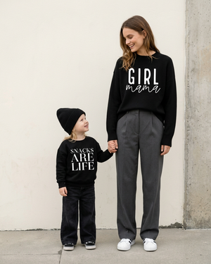 Full-body front view of mom and daughter