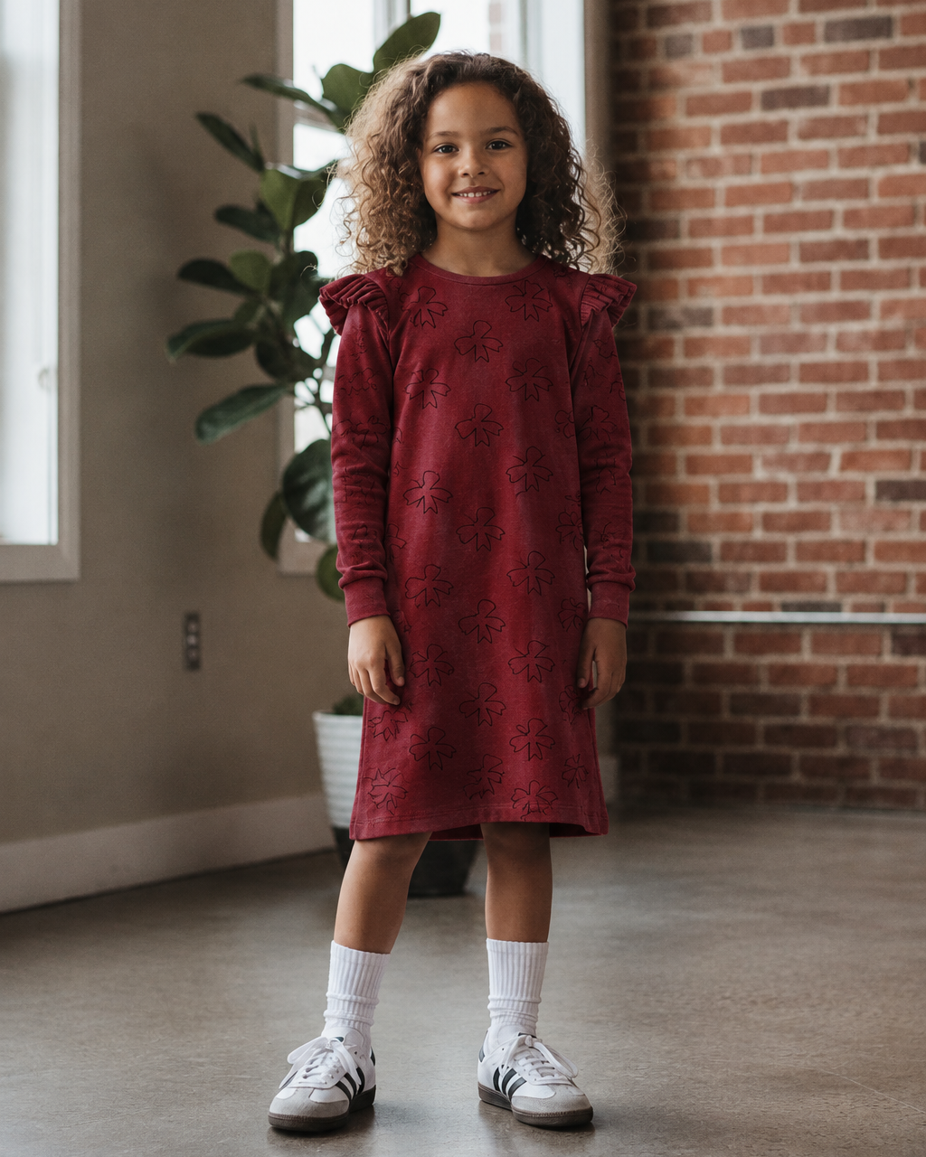 Girl’s dress in burgundy bow fabric
