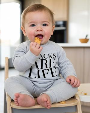 Natural-looking baby snack photo with extra cropping space