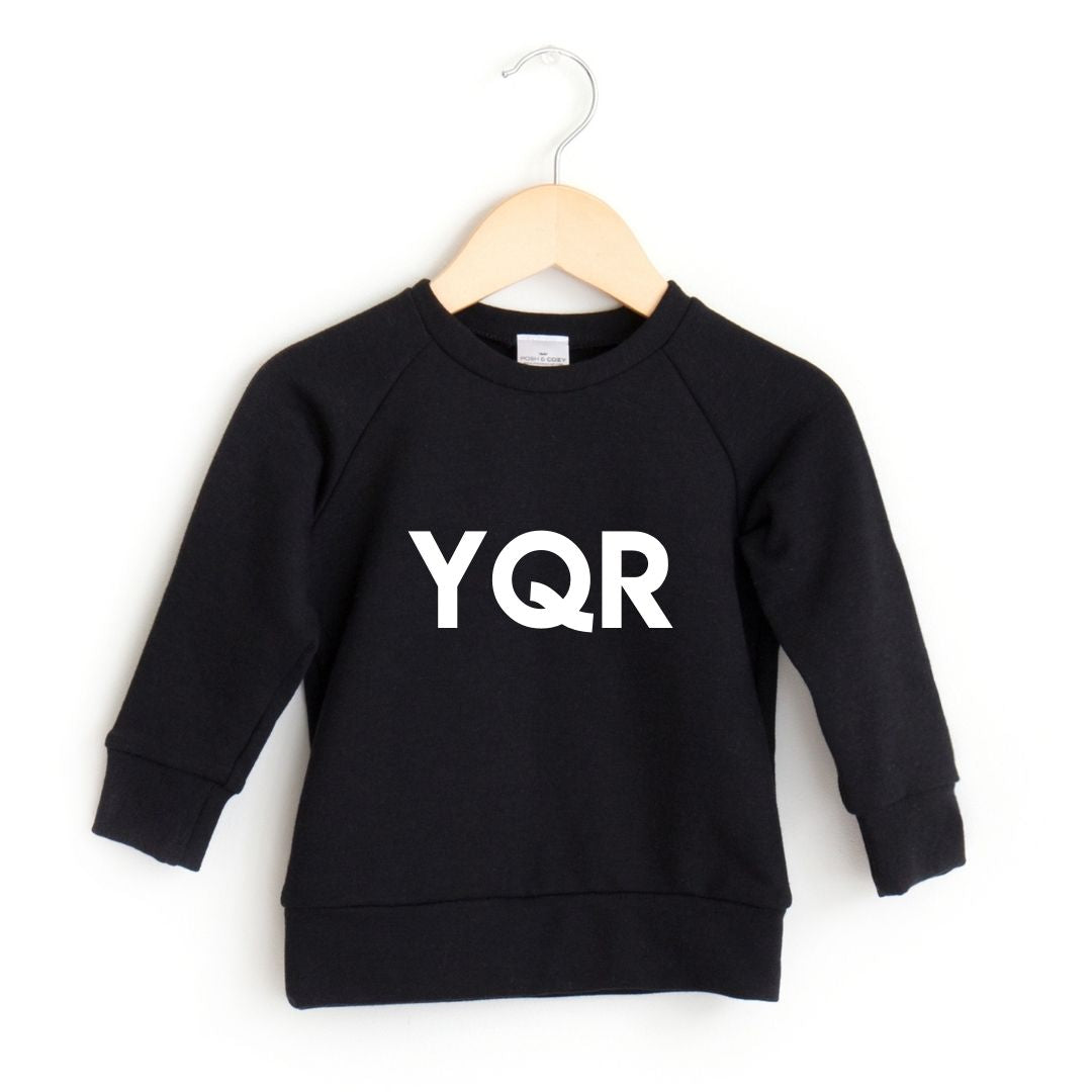 Brothers in navy crewnecks with white YVR and LIL BRO lettering